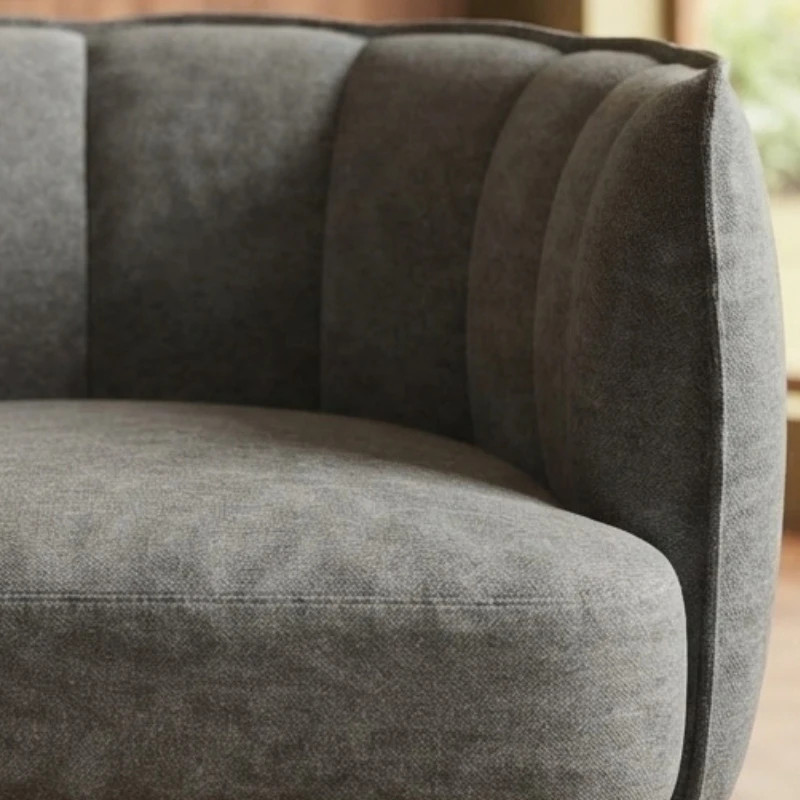 Fauteuil en tissu gris capitonné pieds hévéa WINDSOR Sofacasa